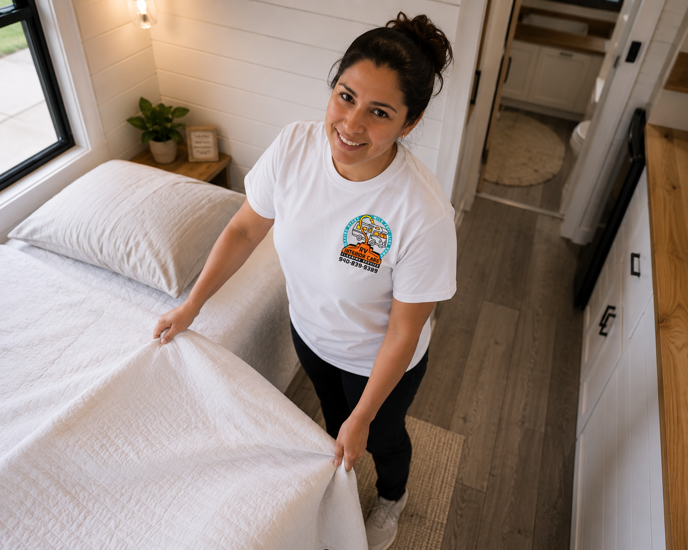 RV Interior Care team member making a bed in a tiny home in Northwest Texas